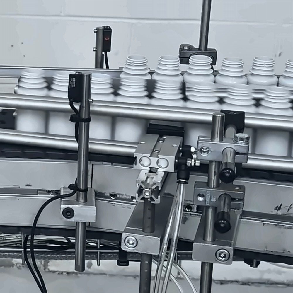 Close-up of the conveyor gate and sensor